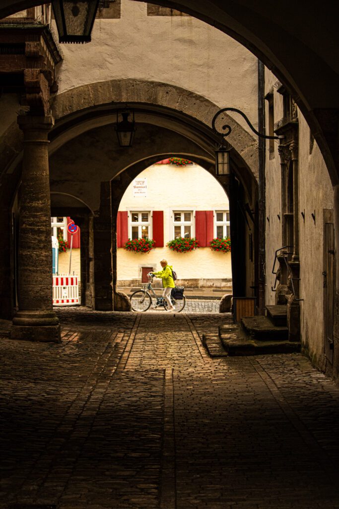 An arch in Rothenburg ob der Tauber made the perfect frame for a cyclist passing by