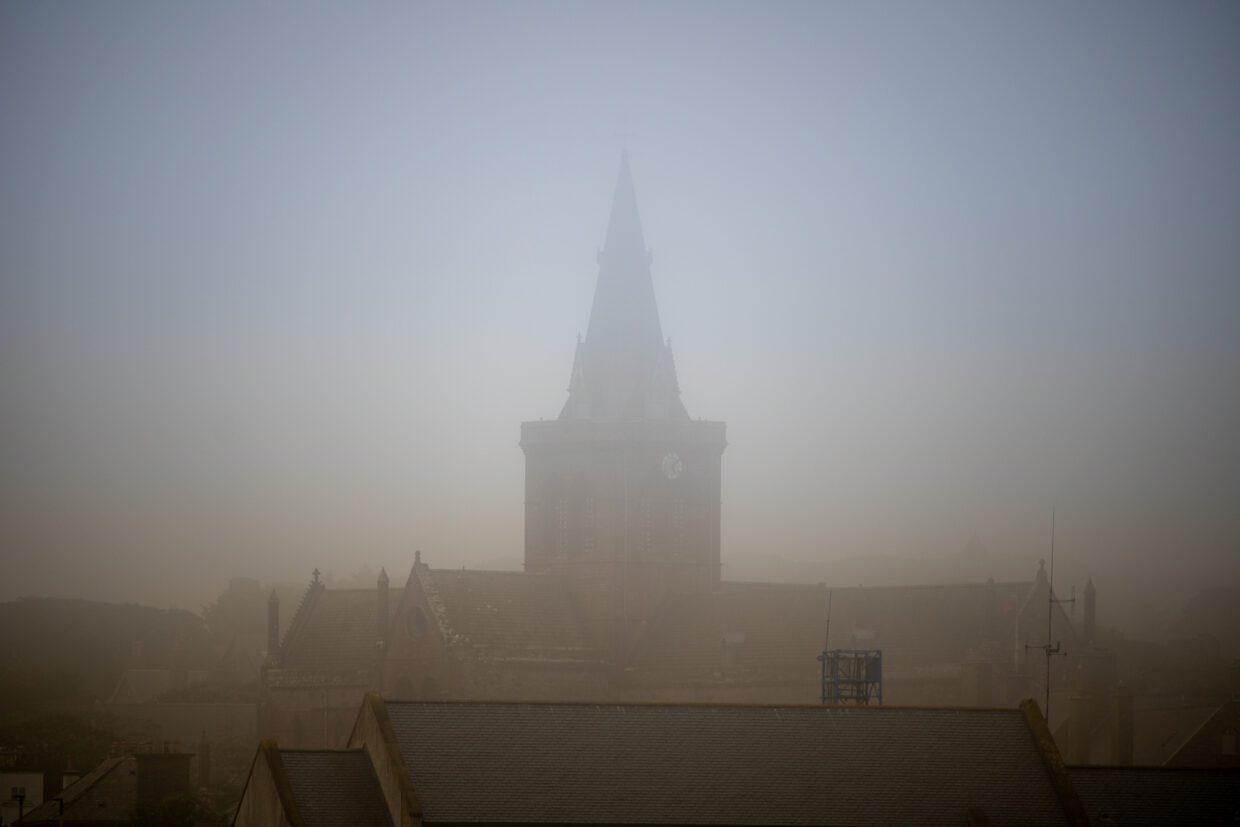 St Magnus Cathedral in the foggy Orcadian evening.